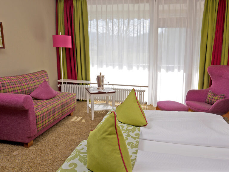 Das Deluxezimmer ist farblich perfekt abgestimmt und bewirkt eine warme Athmosphäre.